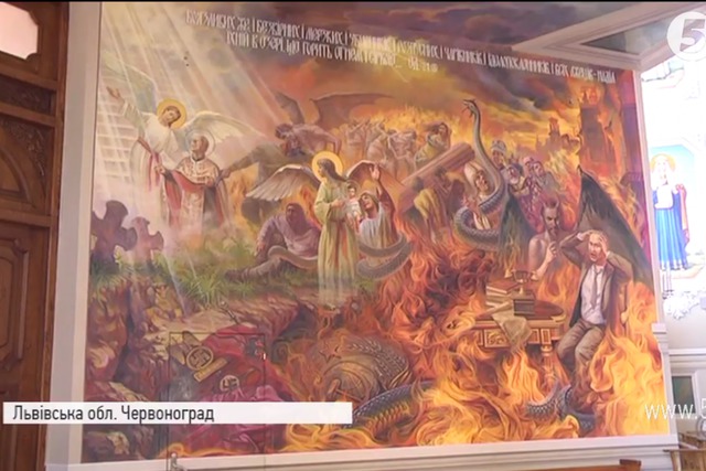 Mural depicting Putin burning in hell painted in Lviv region сhurch 04