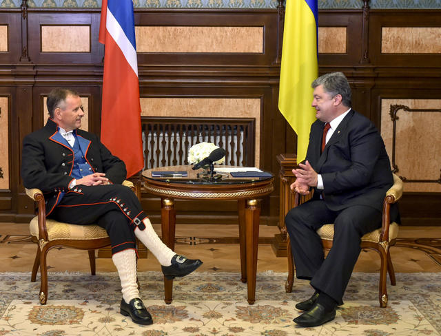 посол
