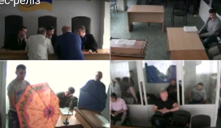 "Slut and whore! You will suffer, bitch! You will burn in hell!" - detained Tornado fighters disrupt court hearing in their case. VIDEO