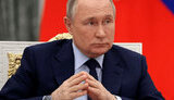 путін