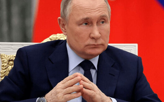 путін