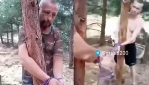 Росіяни прив’язали до дерева двох "відмовників": "Вообще п#здец. Жопа какая полосатая. Отшлепали?". ВIДЕО