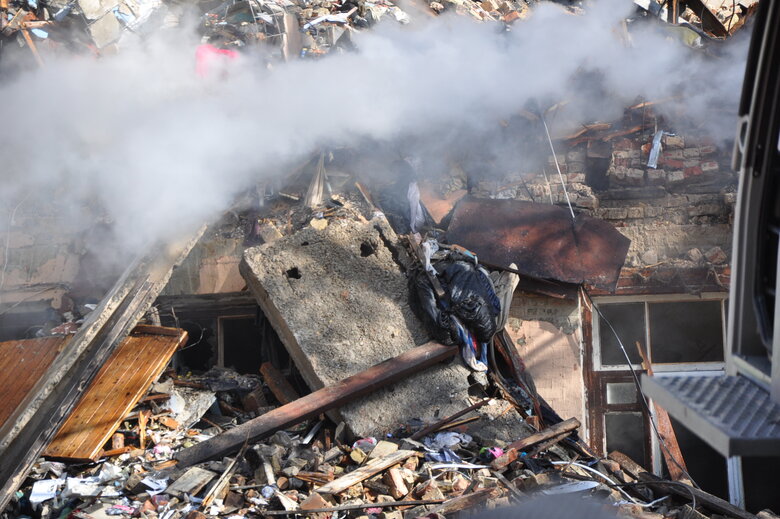 At site of kamikaze drone attack in Kyiv, rubble is being cleared 11