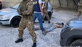 Поліція в Харкові знешкодила банду, що вимагала $100 тис. у місцевого мешканця. ФОТОрепортаж