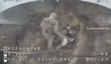 Kamikaze drone hits occupier in back. VIDEO