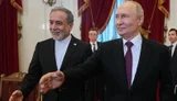 Глава МЗС Ірану Аббас Арагчі й російський диктатор Володимир Путін