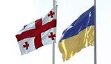 РУКА, ПРОТЯНУТАЯ УКРАИНЕ И ГРУЗИИ (Le Monde)