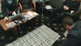 НАБУ затримало чиновника Держрезерву під час спроби дати хабар $40 тис. своєму начальнику за участь у корупційній схемі. ФОТОрепортаж