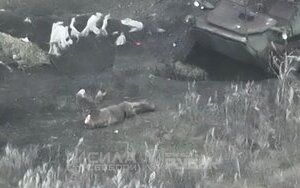 Wounded occupier on battlefield
