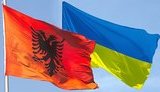 албания