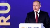 путін