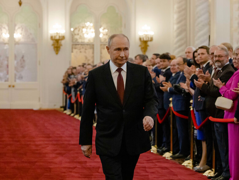 путін