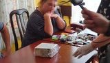 Жінка вимагала 4 млн грн за вплив на чиновників АМКУ: її затримали під час одержання частини суми. ФОТО