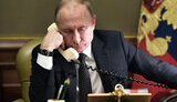 путін