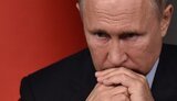 путін