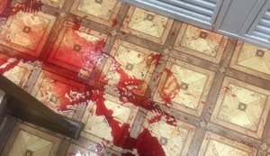Ex-Berkut officers sprayed with red liquid during trial. PHOTOS