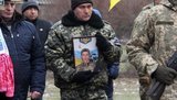 С погибшим от пули снайпера воином 57-й ОМПБр Сергеем Гузенко простились на Херсонщине. ФОТОрепортаж