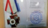 На адмінмежі з окупованим Кримом затримали чоловіка з медалями від окупантів. ФОТО