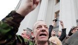 КС встал на сторону Азарова в споре с чернобыльцами: соцвыплаты будет регулировать Кабмин