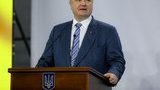 Зараз лечу на фронт, щоб відвідати наших добровольців, - Порошенко