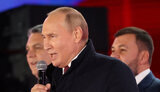 путін
