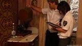 В Донецке за коммунальные долги у пенсионерки забрали старый телевизор и швейную машинку. ФОТОрепортаж
