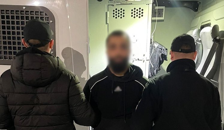 Подозреваемый в разбойном нападении на инкассаторов в Житомире экстрадирован из Германии, - Нацполиция. ФОТОРЕПОРТАЖ