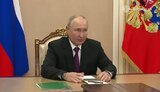 путін