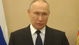 путін