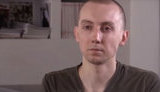 Щохвилини, поки ми тут, у центрі мого Донецька когось жорстко катують, - звільнений журналіст Асєєв у Мюнхені