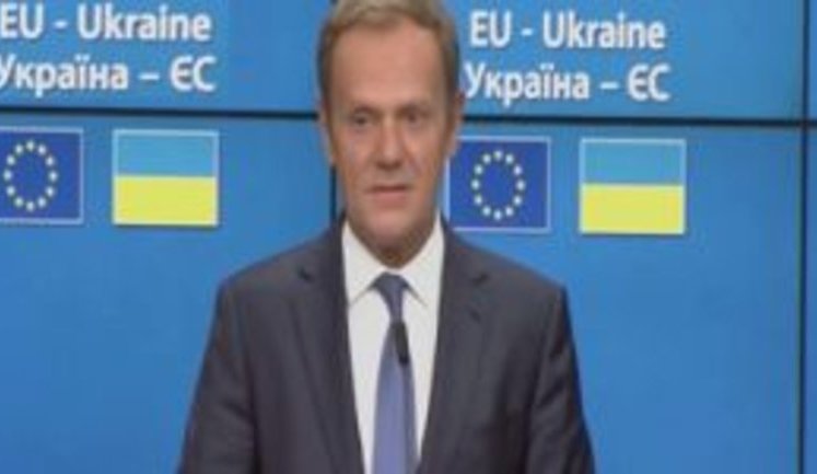 "You are unique example of courage, honor and practical mind," - Tusk starts his speech in Ukrainian language. VIDEO