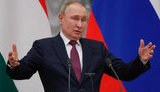 путін