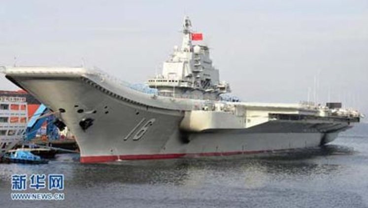 China Lands Fighter Jet on Aircraft Carrier Bought from Ukraine. PHOTO