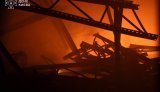 Нежитлова будівля горить у Голосіївському районі Києва після атаки РФ. ФОТОрепортаж