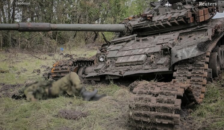 Road to liberated Storozhove is littered with corpses of occupants and burnt armored vehicles - Reuters. PHOTOS