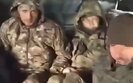Russians in handcuffs are on their way to storm
