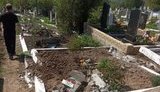 Терористи на окупованій Луганщині військовою технікою проїхалися кладовищем, знищивши десятки могил. ФОТО