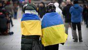 українці