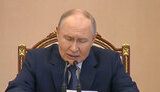 путін