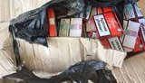 Налоговики обнаружили в "серой зоне" перевалочную базу, где хранились сигареты с акцизными марками "ДНР" и "ЛНР". ФОТО