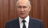 путін