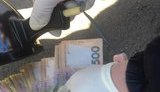 Сотрудник патрульной полиции задержан в Виннице на взятке 300 долл. от водителя, - СБУ. ФОТО