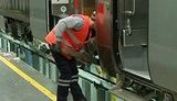 Ukrainian Railway Workers Service Modern Hyundai Trains by Wooden Sticks. VIDEO
