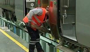Ukrainian Railway Workers Service Modern Hyundai Trains by Wooden Sticks. VIDEO