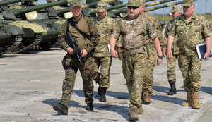 Ukraine to declare martial law if Russia starts using its troops in Donbas more actively, NSDC secretary says