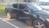 Неизвестные открыли огонь по машине в Киеве и забрали у пострадавшей 2 млн грн. ФОТО