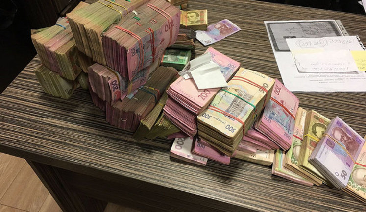 SBU reveals millions stolen by Kyiv road company, seizes 4M of undeclared cash. PHOTOS