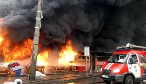 Human body discovered at burning thrift market in Kyiv. PHOTOS