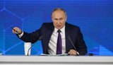 путін
