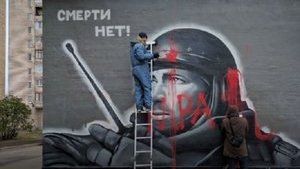 Unknown person taints terrorist Motorola’s portrait in St. Petersburg. SURVEILLANCE FOOTAGE+PHOTO